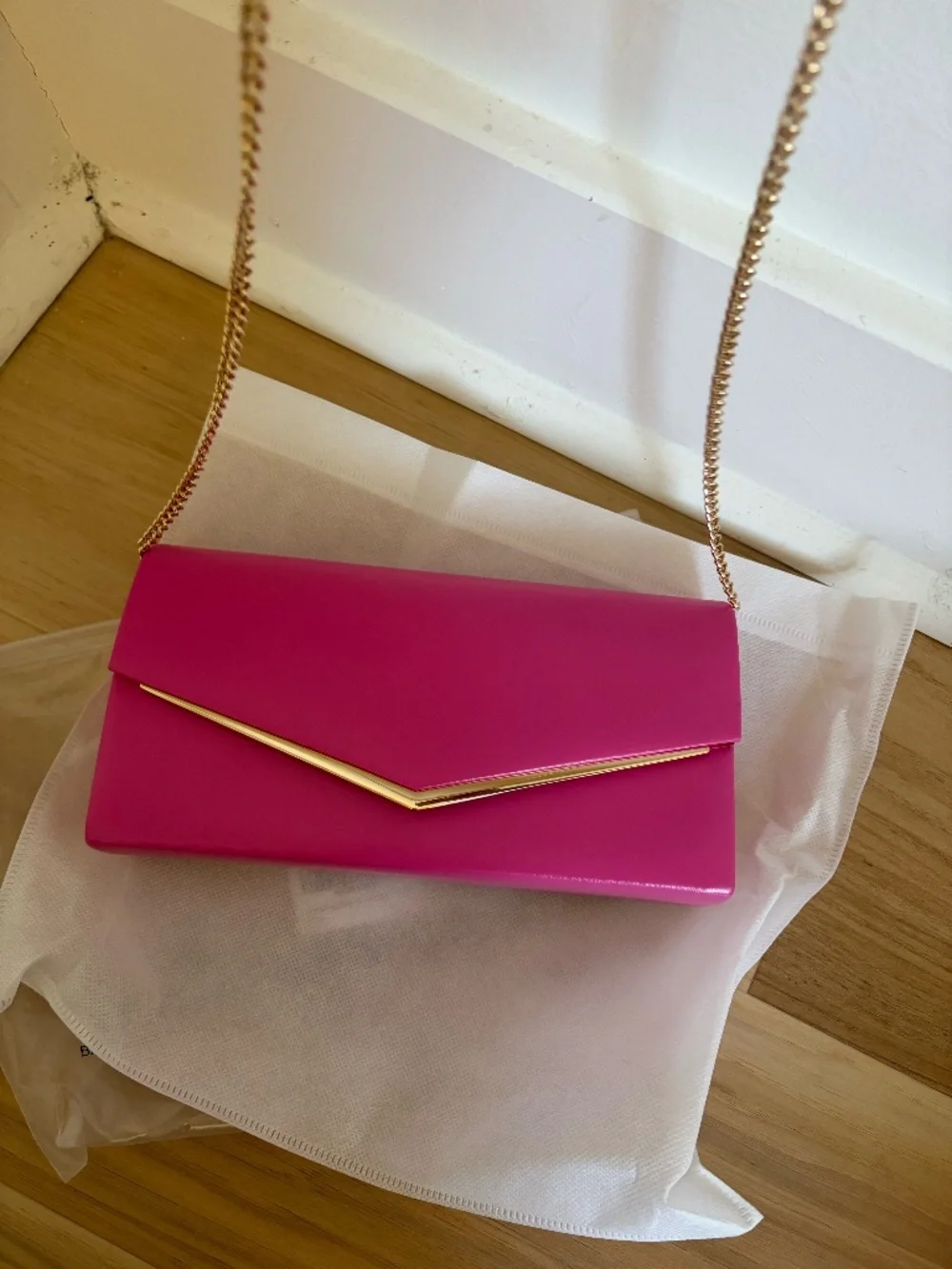 Pink and gold shoulder bag